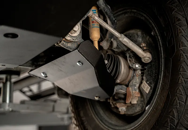 Cali Raised 05-23 Toyota Tacoma Lower Control Arm Skid Plate 1